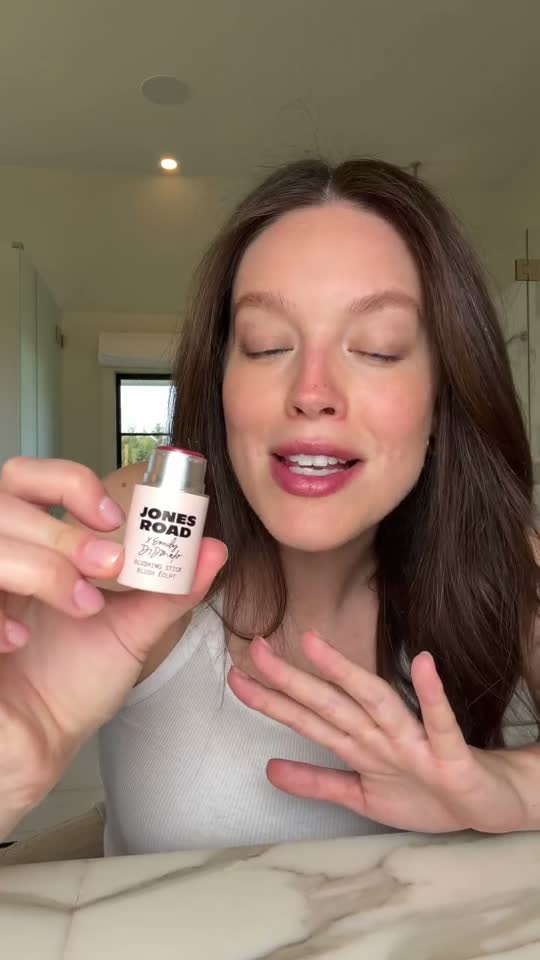 Jones Road Beauty raw honest review showing a creator holding the product to camera